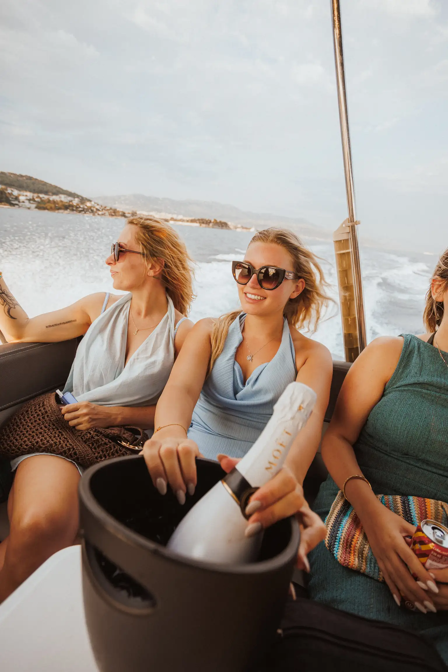 Three friends enjoying a fast private boat ride along the Dalmatian coast